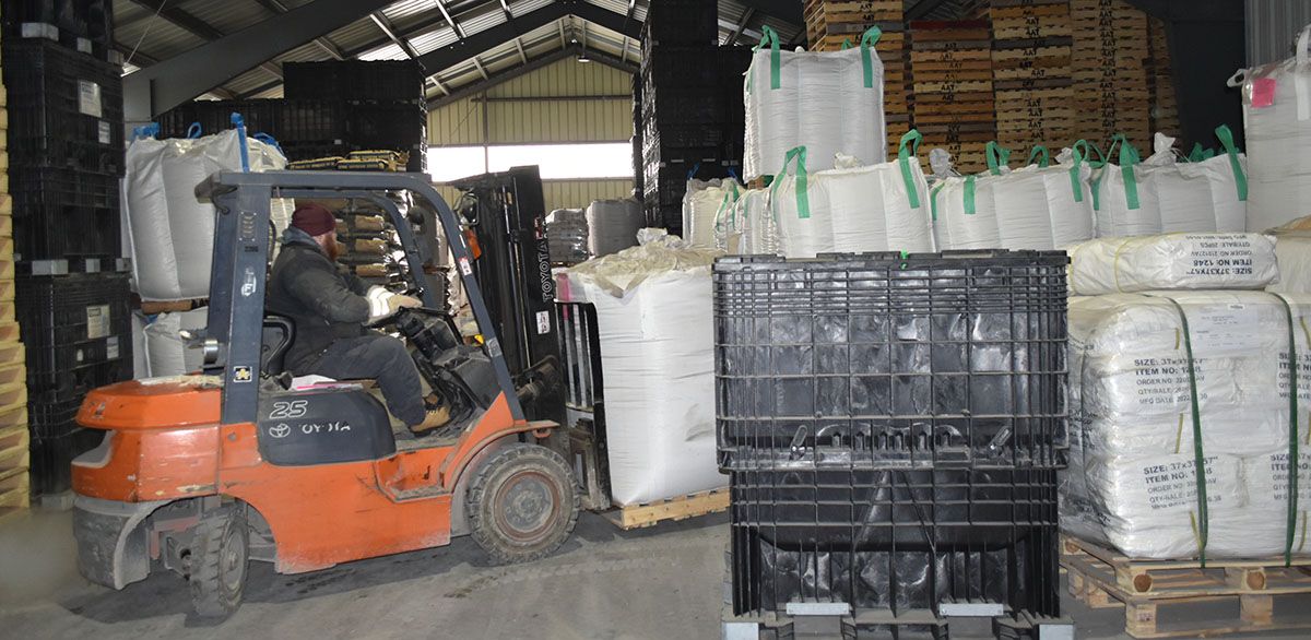 Alliance Agri-Turf employee working at warehouse
