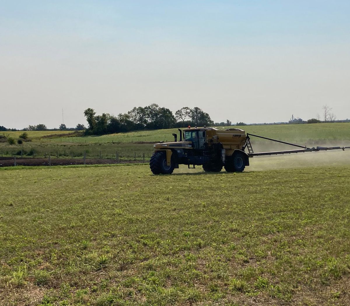 Alliance Agri-Turf fertilizer equipment working on crop