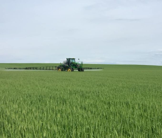 Alliance Agri-Turf fertilizer equipment working on crop Ontario Pesticide Education Program