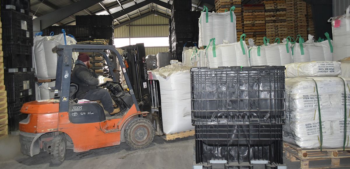 Alliance Agri-Turf employee working at warehouse