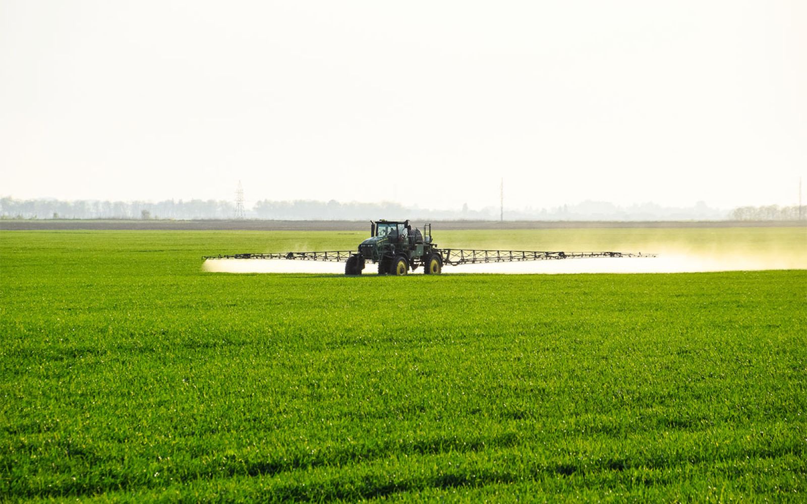 Photo of Alliance Agri-Turf fertilizer equipment working on lawn fertilizer Alliance Agri-Turf Lawn Fertilizer